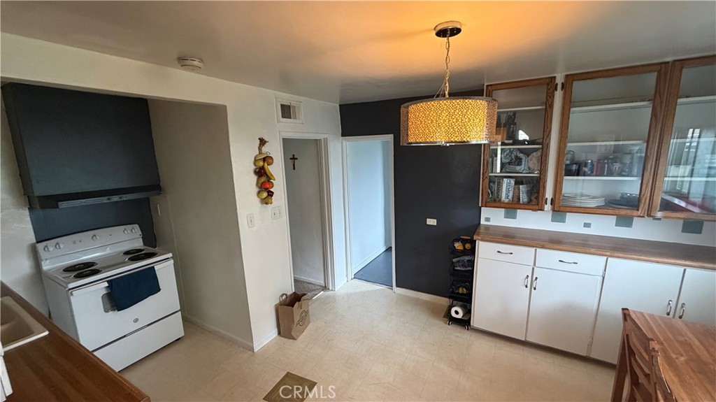 475 Wiltsey Road Red Bluff, CA 96080 - Photo 10 of 33 a kitchen with stainless steel appliances granite countertop a refrigerator and a sink