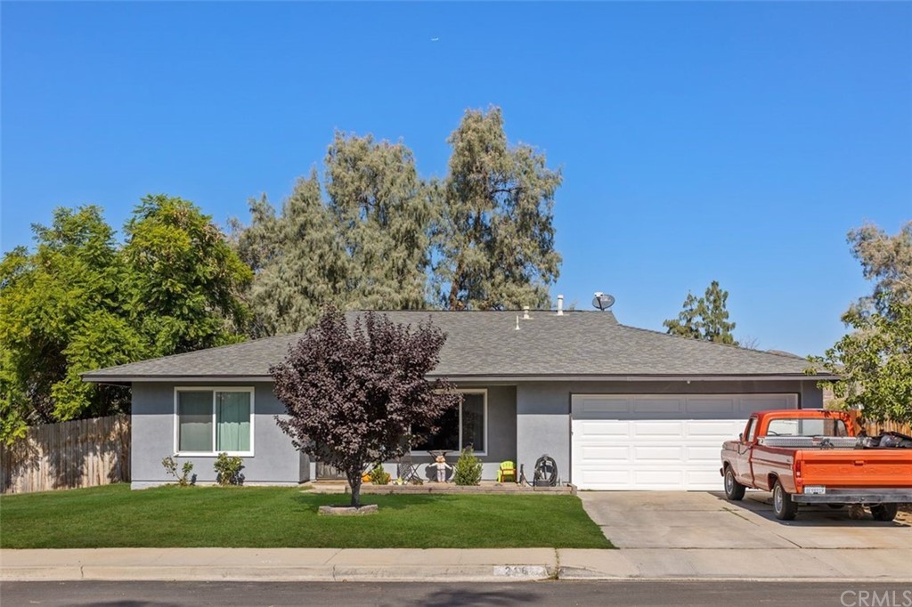 216 Cliffhill Place Riverside, CA 92501 - Photo 1 of 1 a front view of a house with a garden