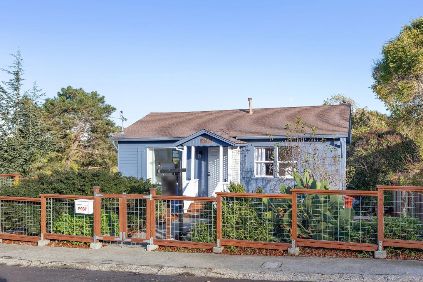 3946 La Colina Road El Sobrante, CA 94803 - Photo 1 of 49 a front view of a house with garden