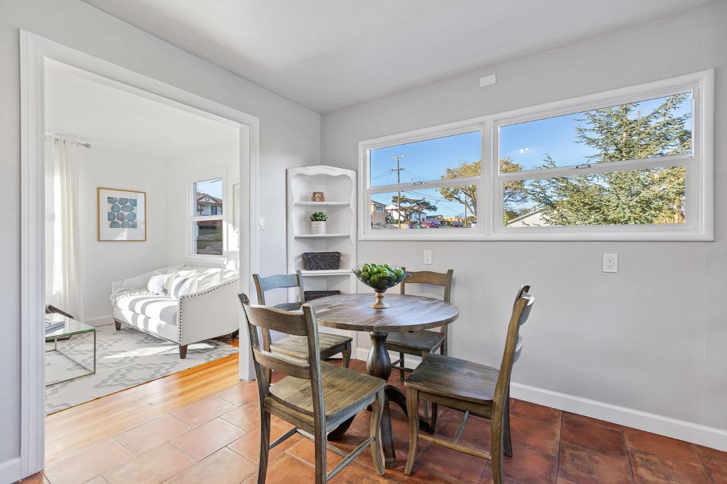 3946 La Colina Road El Sobrante, CA 94803 - Photo 13 of 49 a view of a dining room with furniture a rug and wooden floor