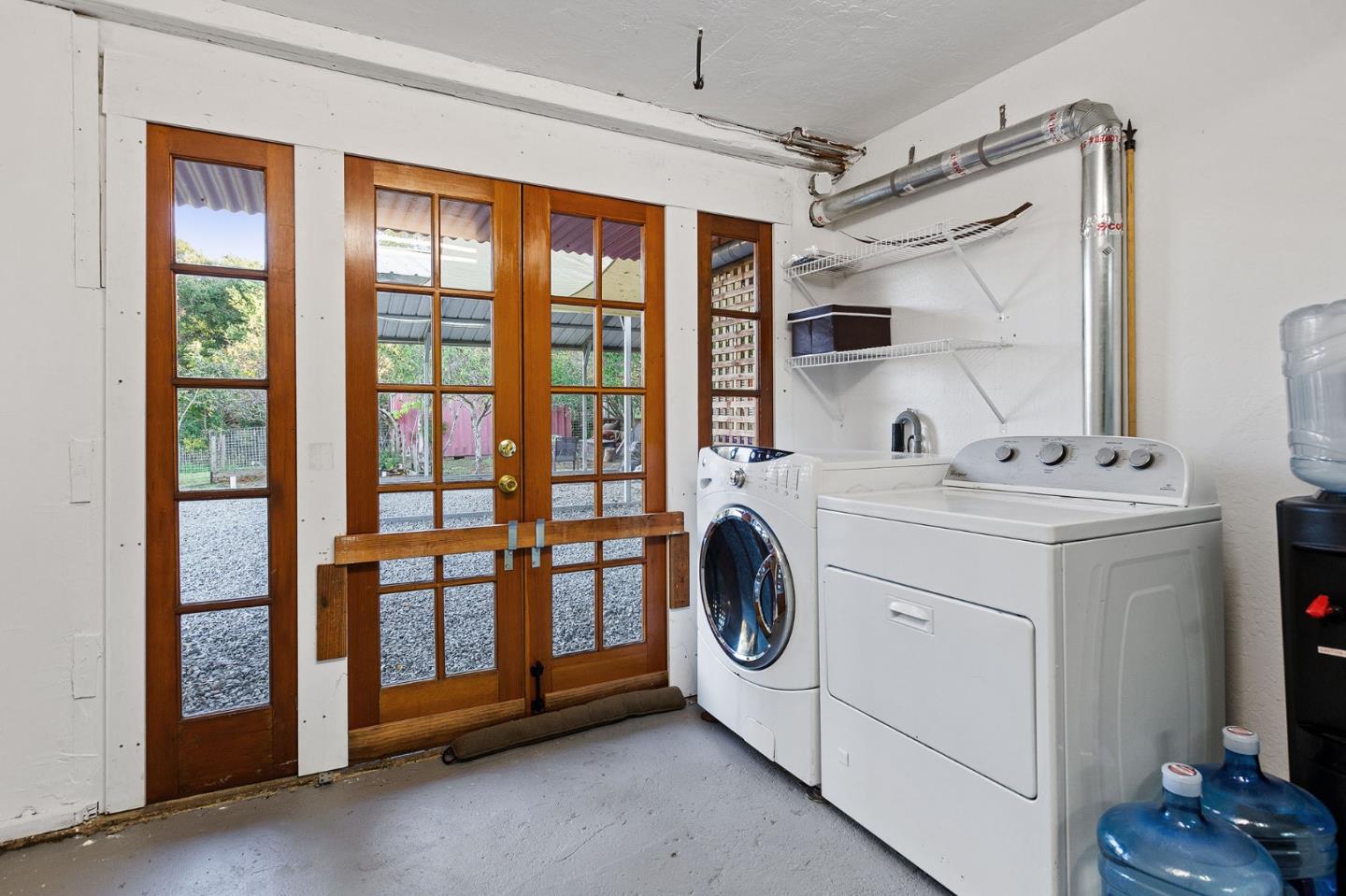 3946 La Colina Road El Sobrante, CA 94803 - Photo 37 of 49 a utility room with dryer and washer