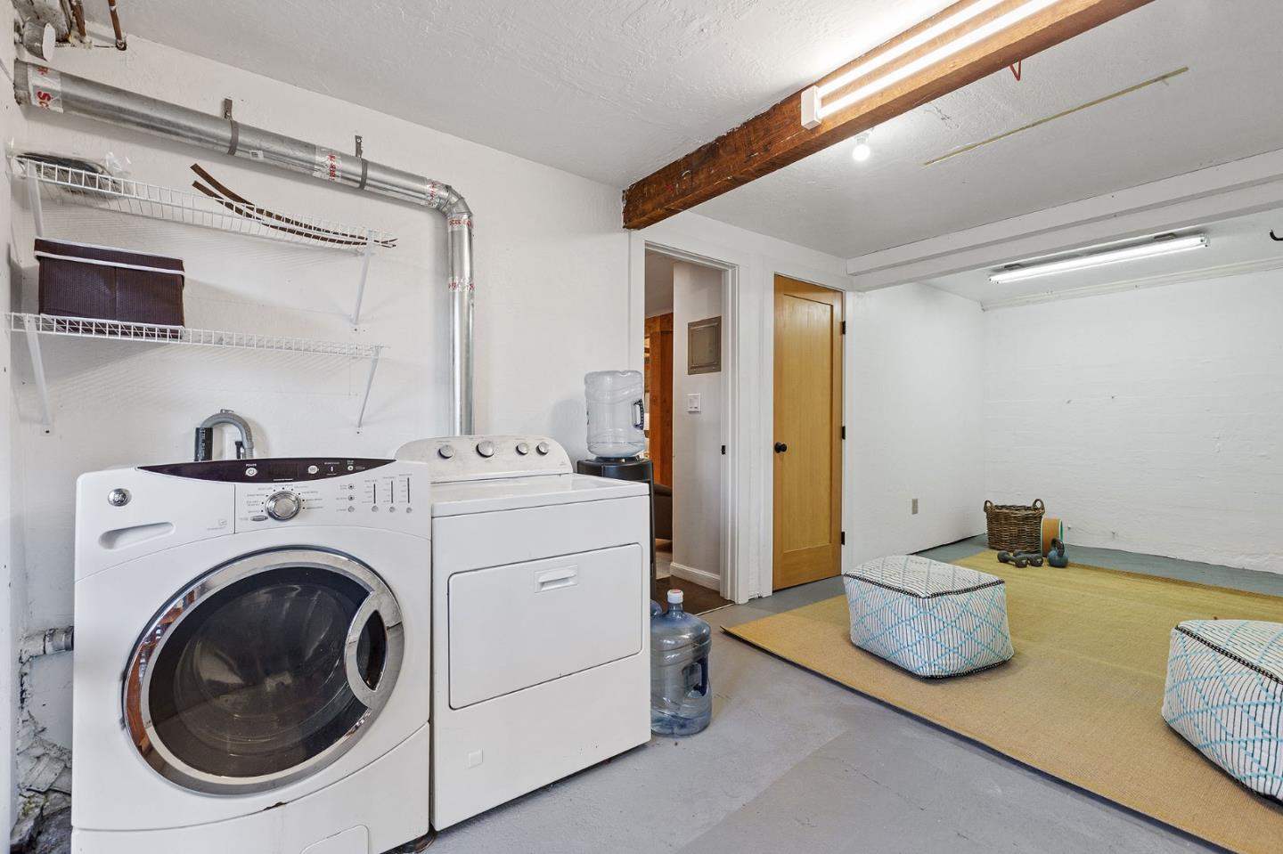 3946 La Colina Road El Sobrante, CA 94803 - Photo 38 of 49 a view of a storage & utility room with two washing machine