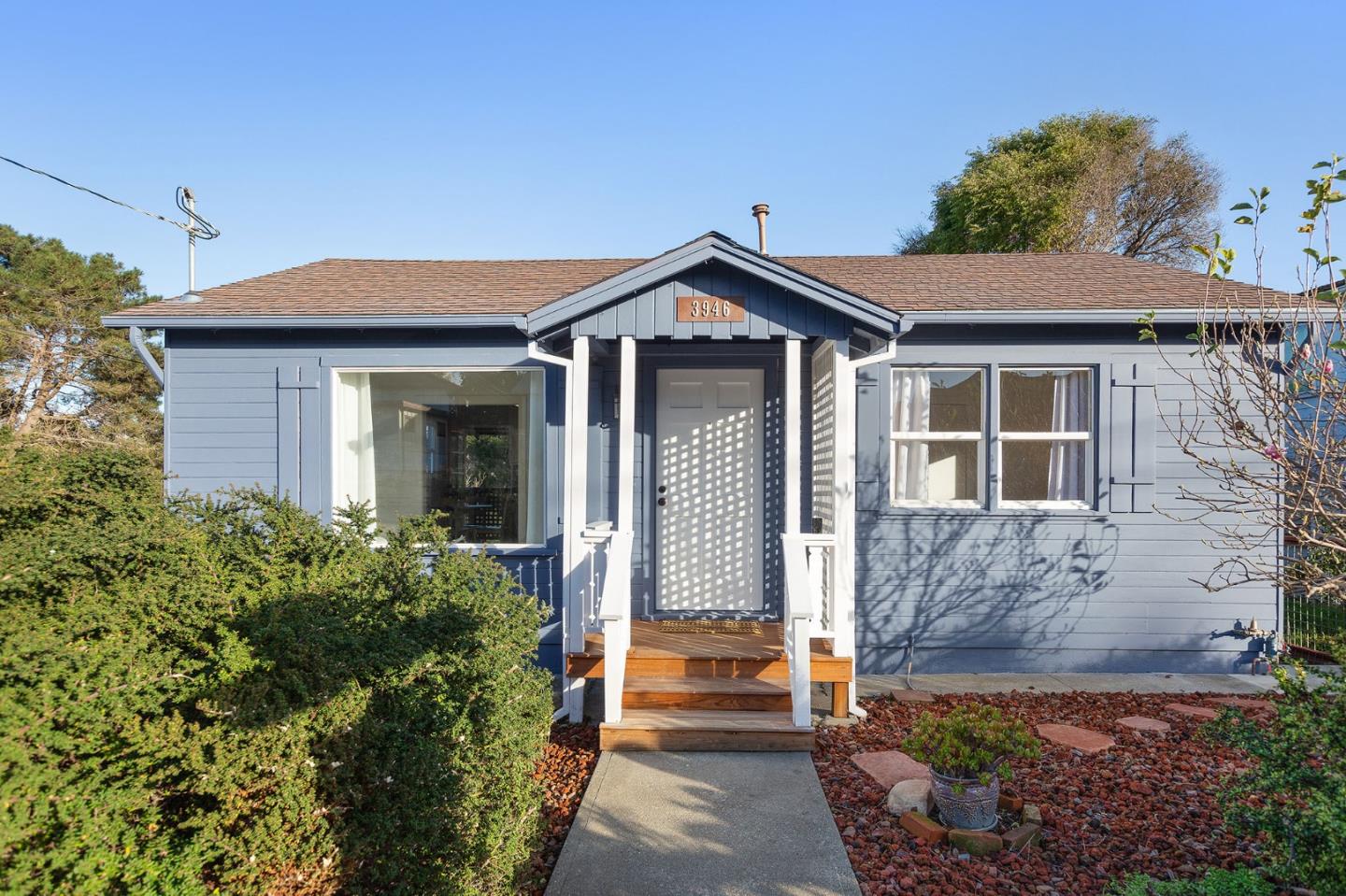 3946 La Colina Road El Sobrante, CA 94803 - Photo 5 of 49 a front view of a house with a yard
