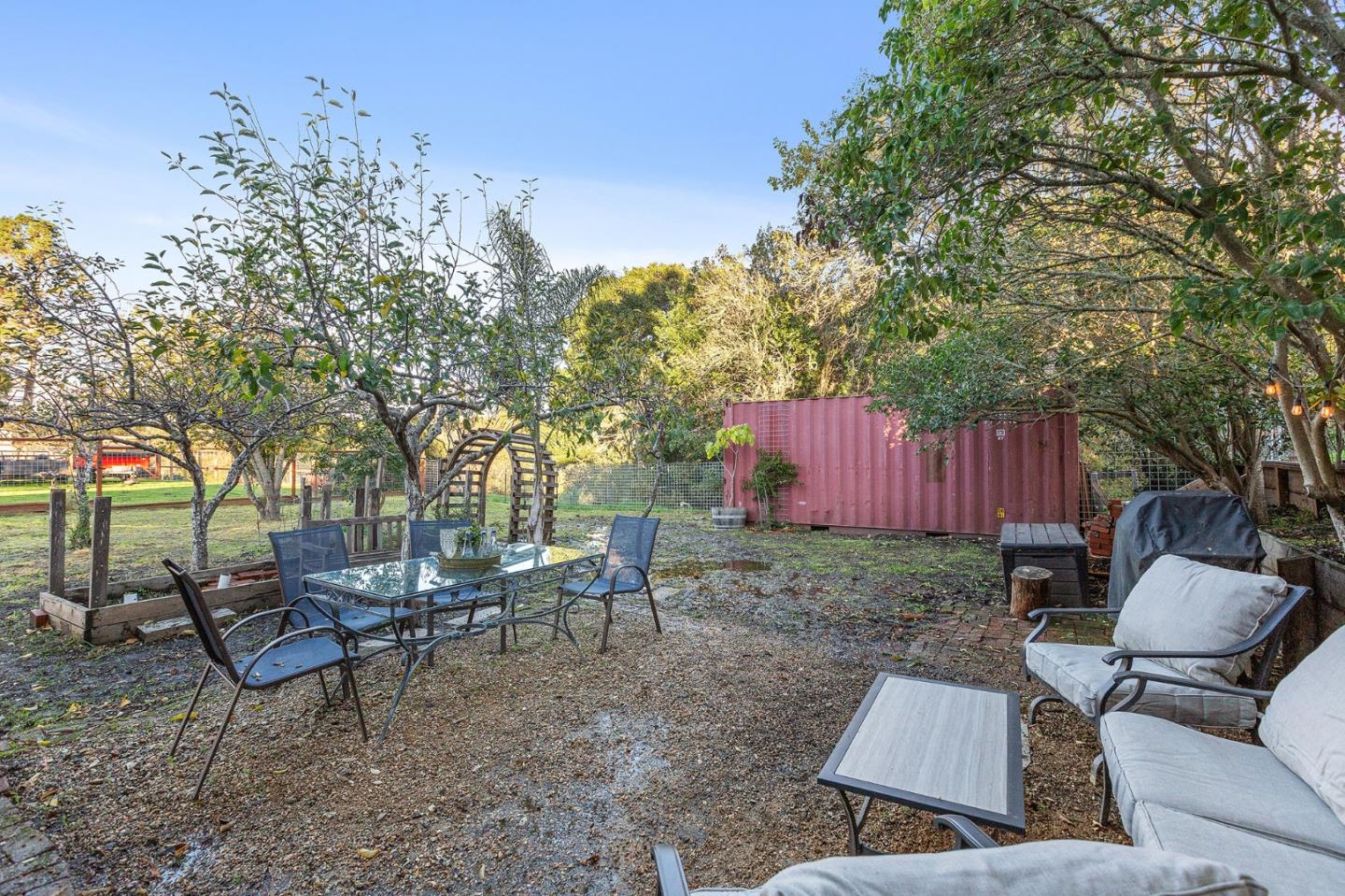 3946 La Colina Road El Sobrante, CA 94803 - Photo 43 of 49 a view of backyard with outdoor seating and trees