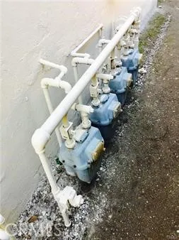 a kitchen with a stove and a mirror