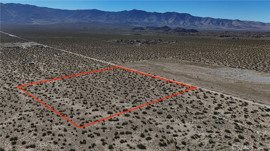789 Meridian Road Lucerne Valley, CA 92356 - Photo 1 of 7 a view of a street with a mountain in the background