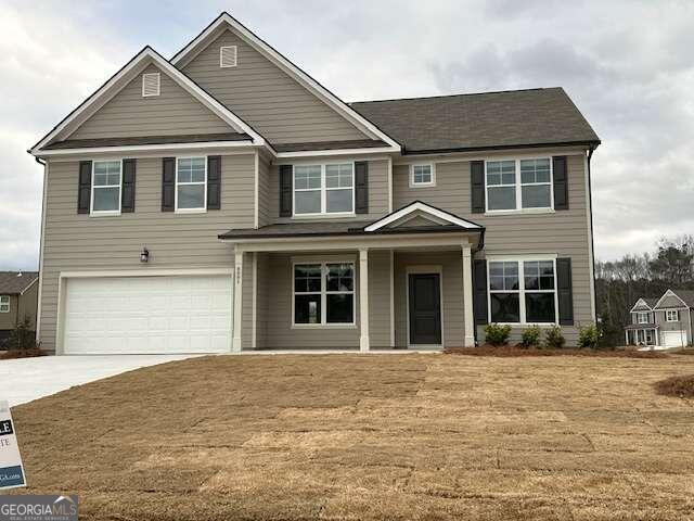 6001 Winternest Drive Austell, GA 30106 - Photo 1 of 1 a front view of a house with a yard
