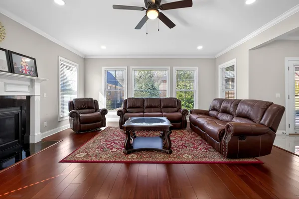 a stove top oven sitting inside of a kitchen