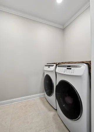 an empty room with wooden floor and a window