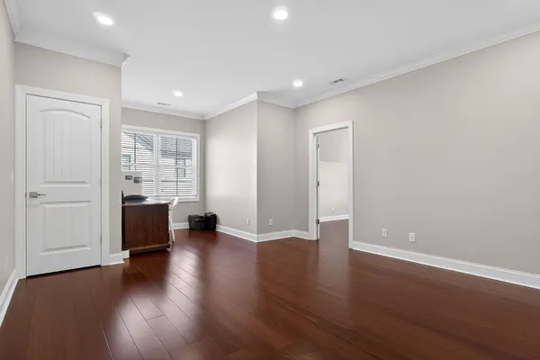 a en suite bathroom with a sink double vanity and a mirror