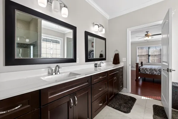 a view of an empty room with furniture and storage