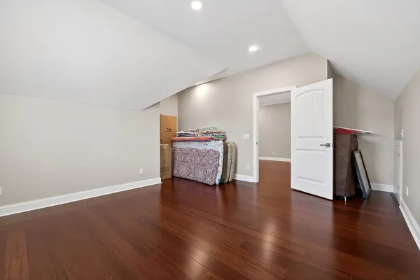 a view of a house with a fence