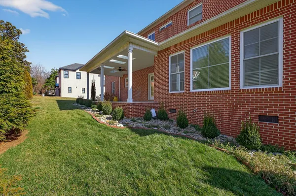 a kitchen that has a sink and a stove