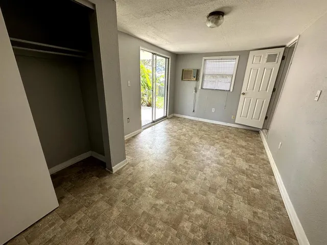a view of hallway with closet
