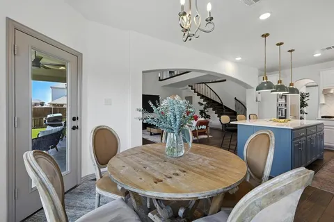 a view of a dining room with furniture