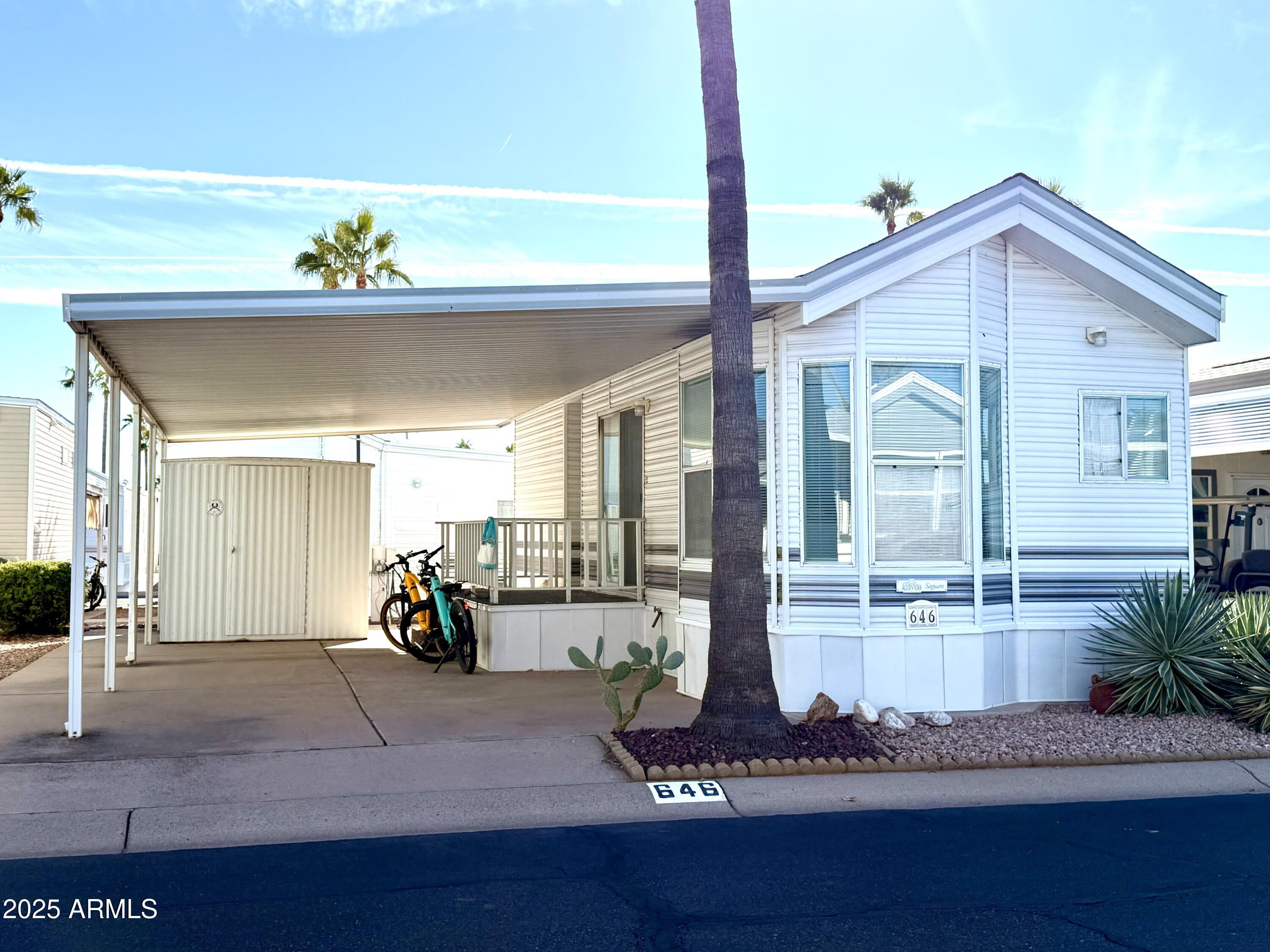 646 Hawks Eye Drive Apache Junction, AZ 85119 - Photo 1 of 17 a view of a entryway front of house