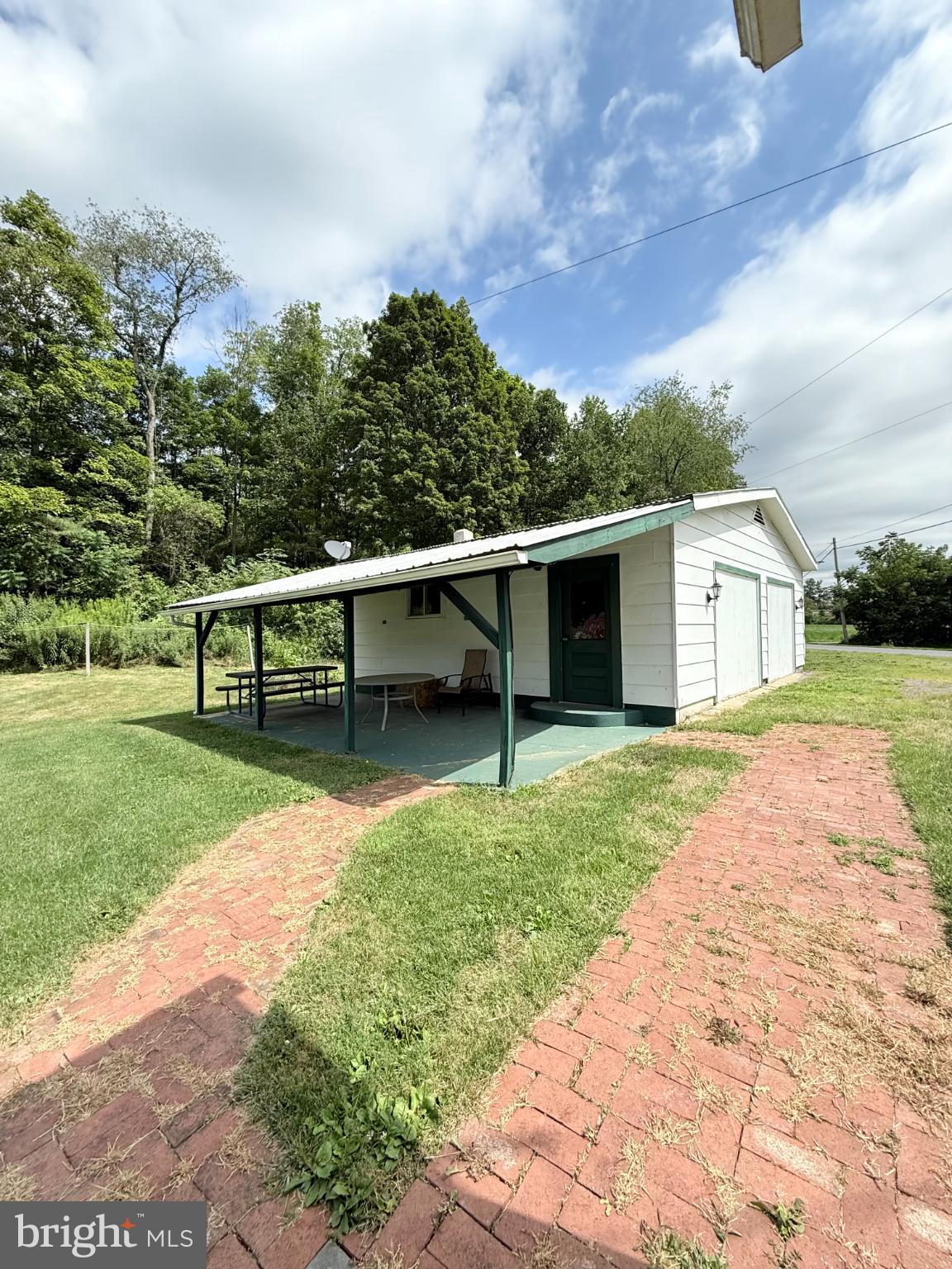 1329 Summer Mountain Road Loganton, PA 17747 - Photo 15 of 56 a view of a house with backyard and garden