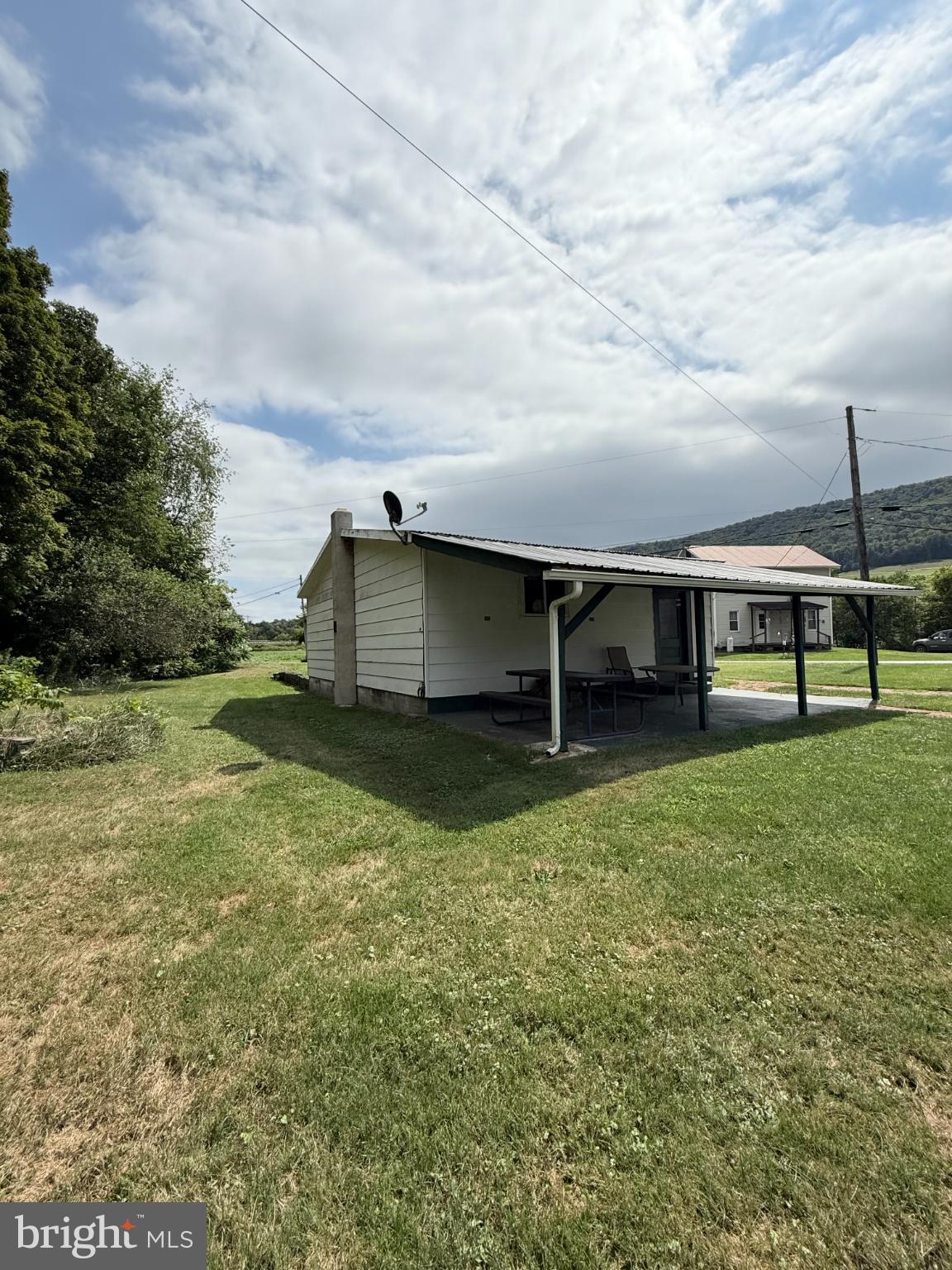 1329 Summer Mountain Road Loganton, PA 17747 - Photo 16 of 56 a view of a garden with a bench
