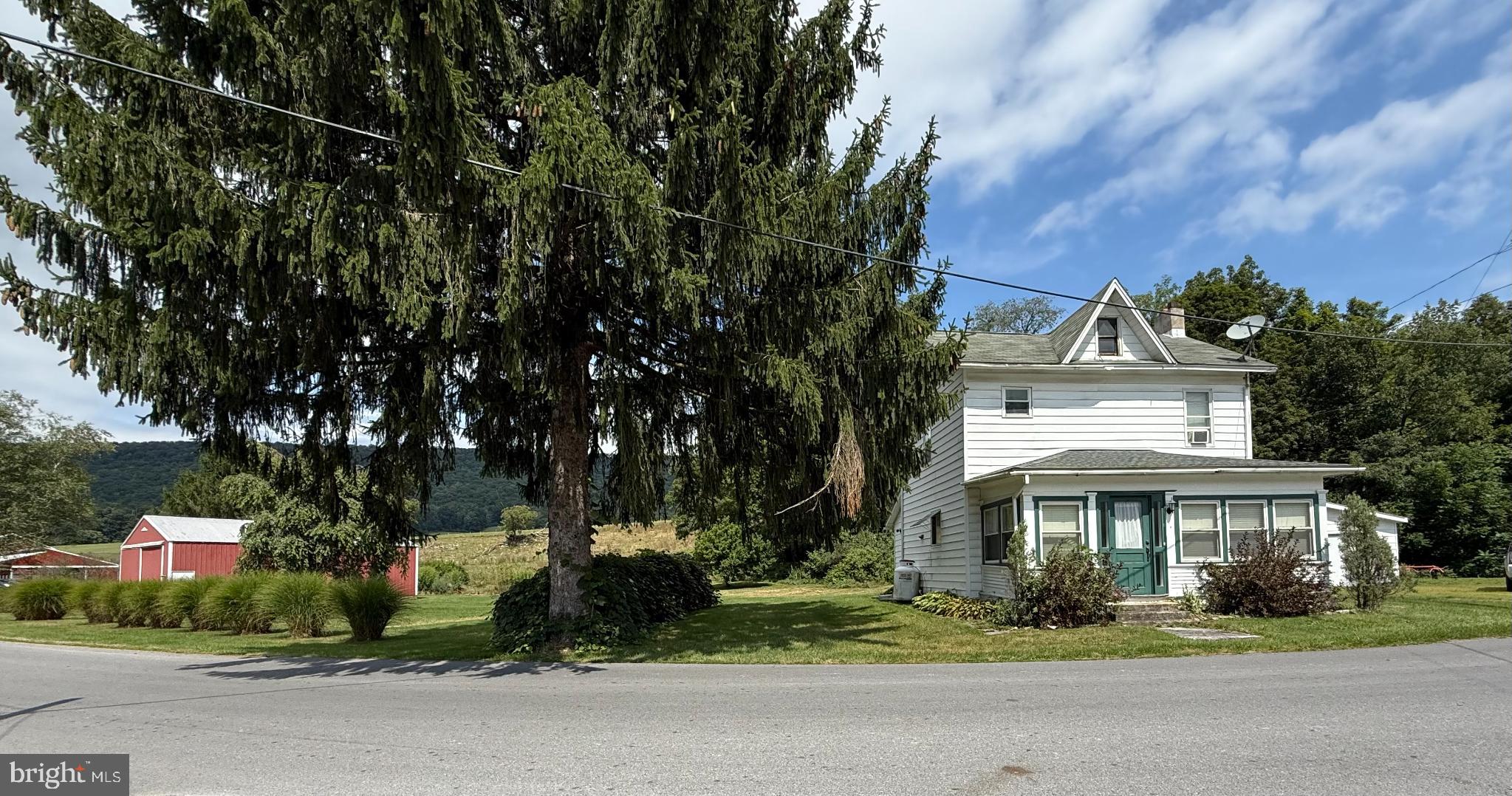 1329 Summer Mountain Road Loganton, PA 17747 - Photo 2 of 56 Charming home nestled by lush greenery.