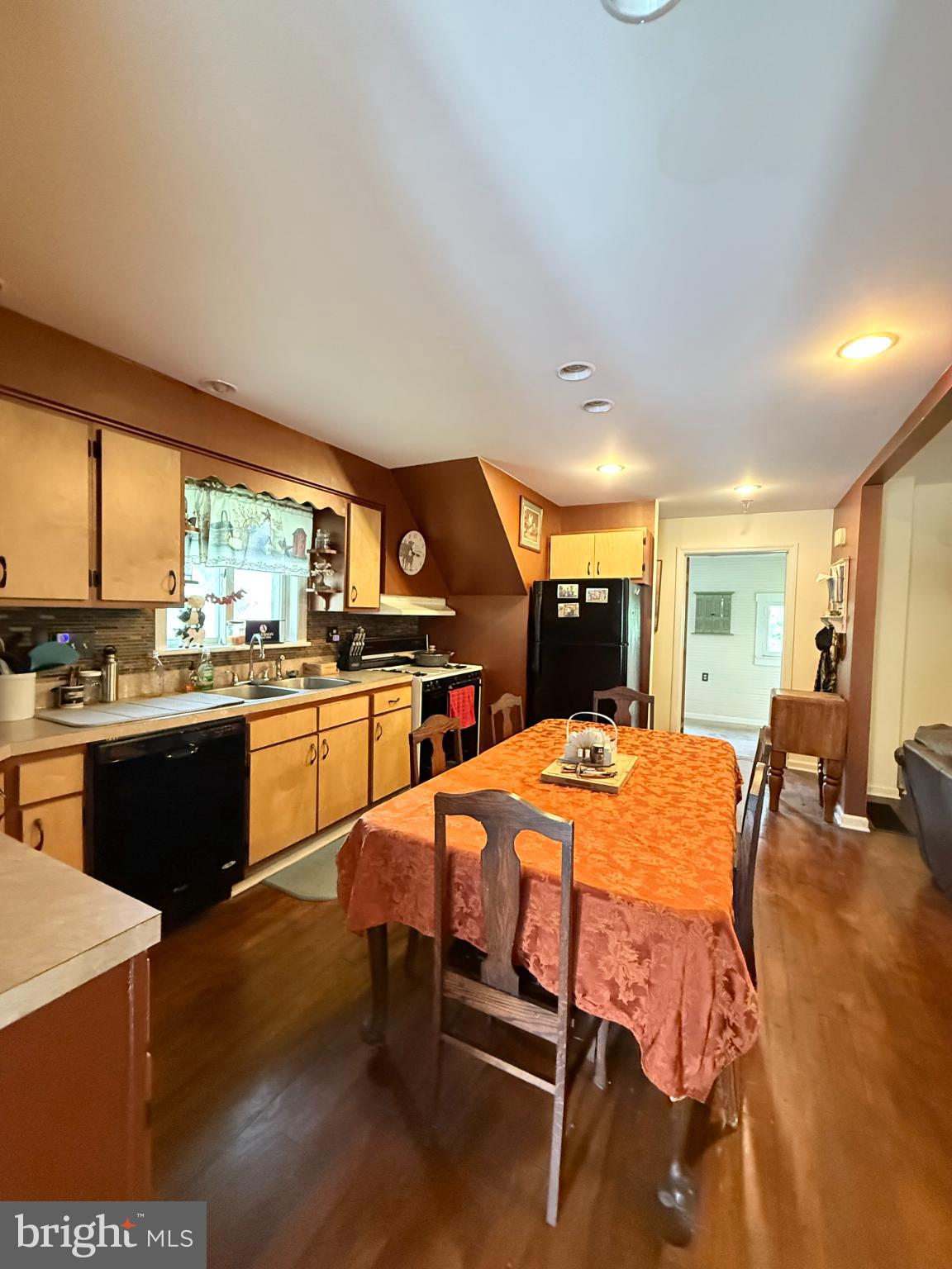 1329 Summer Mountain Road Loganton, PA 17747 - Photo 28 of 56 a large kitchen with a table and chairs in it