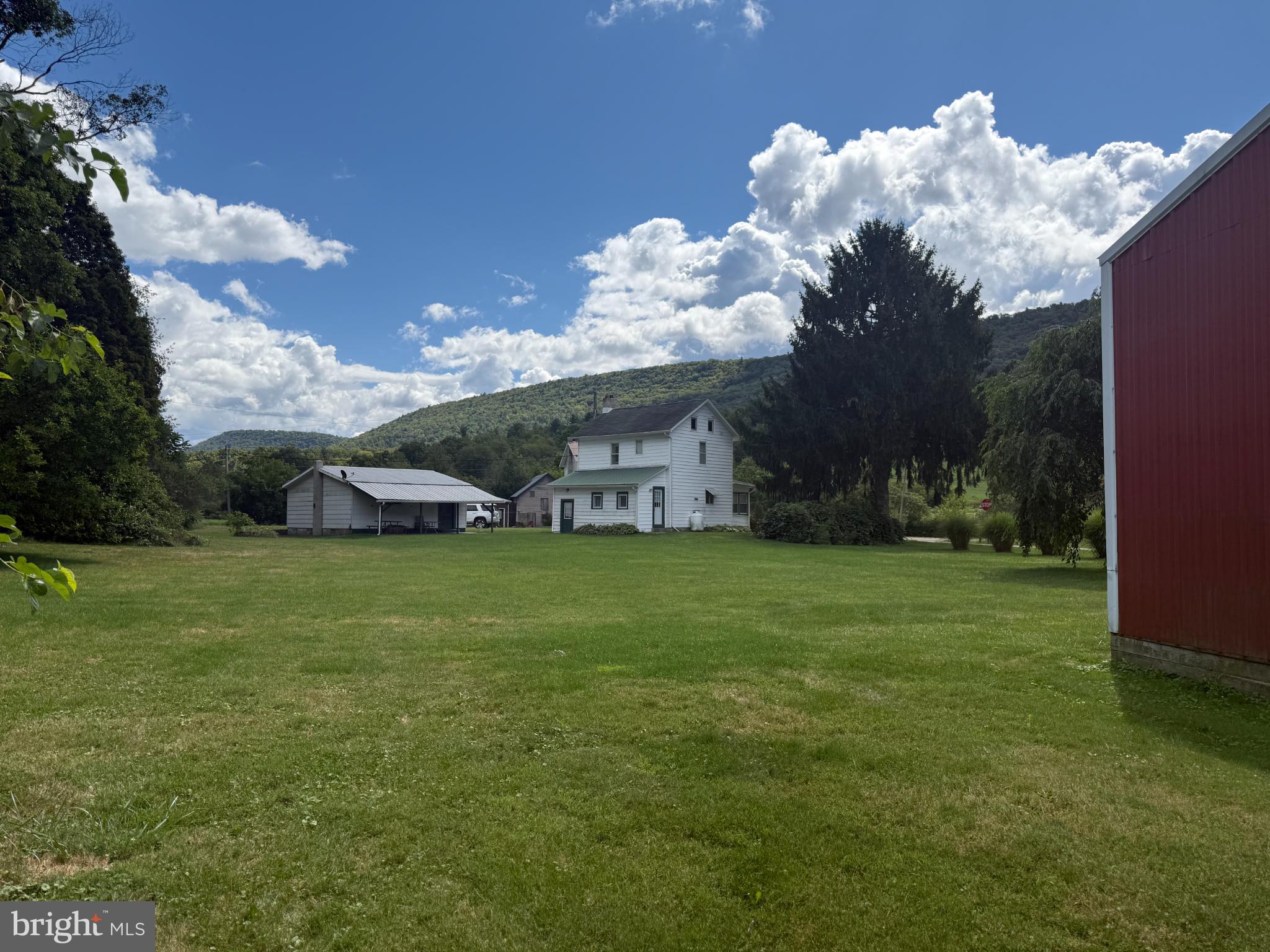 1329 Summer Mountain Road Loganton, PA 17747 - Photo 3 of 56 a view of a house with a big yard