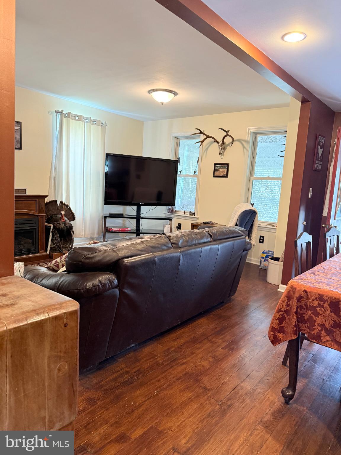 1329 Summer Mountain Road Loganton, PA 17747 - Photo 32 of 56 a room with furniture and a flat screen tv