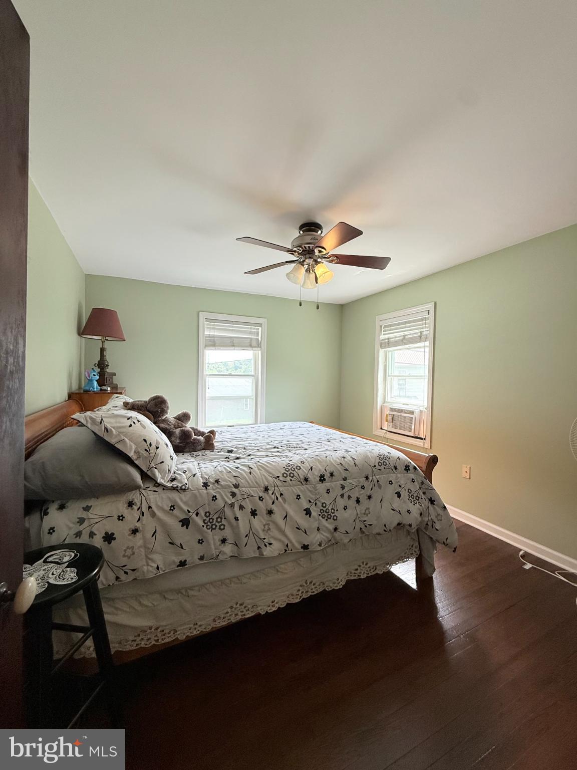 1329 Summer Mountain Road Loganton, PA 17747 - Photo 38 of 56 a bedroom with a bed and wooden floor