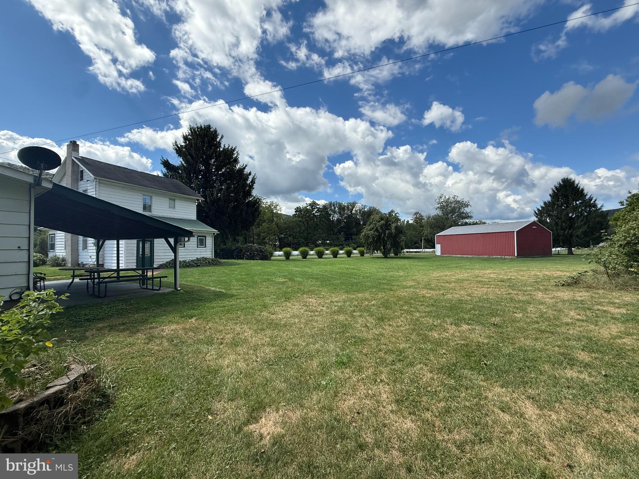 1329 Summer Mountain Road Loganton, PA 17747 - Photo 4 of 56 a view of a house with a yard