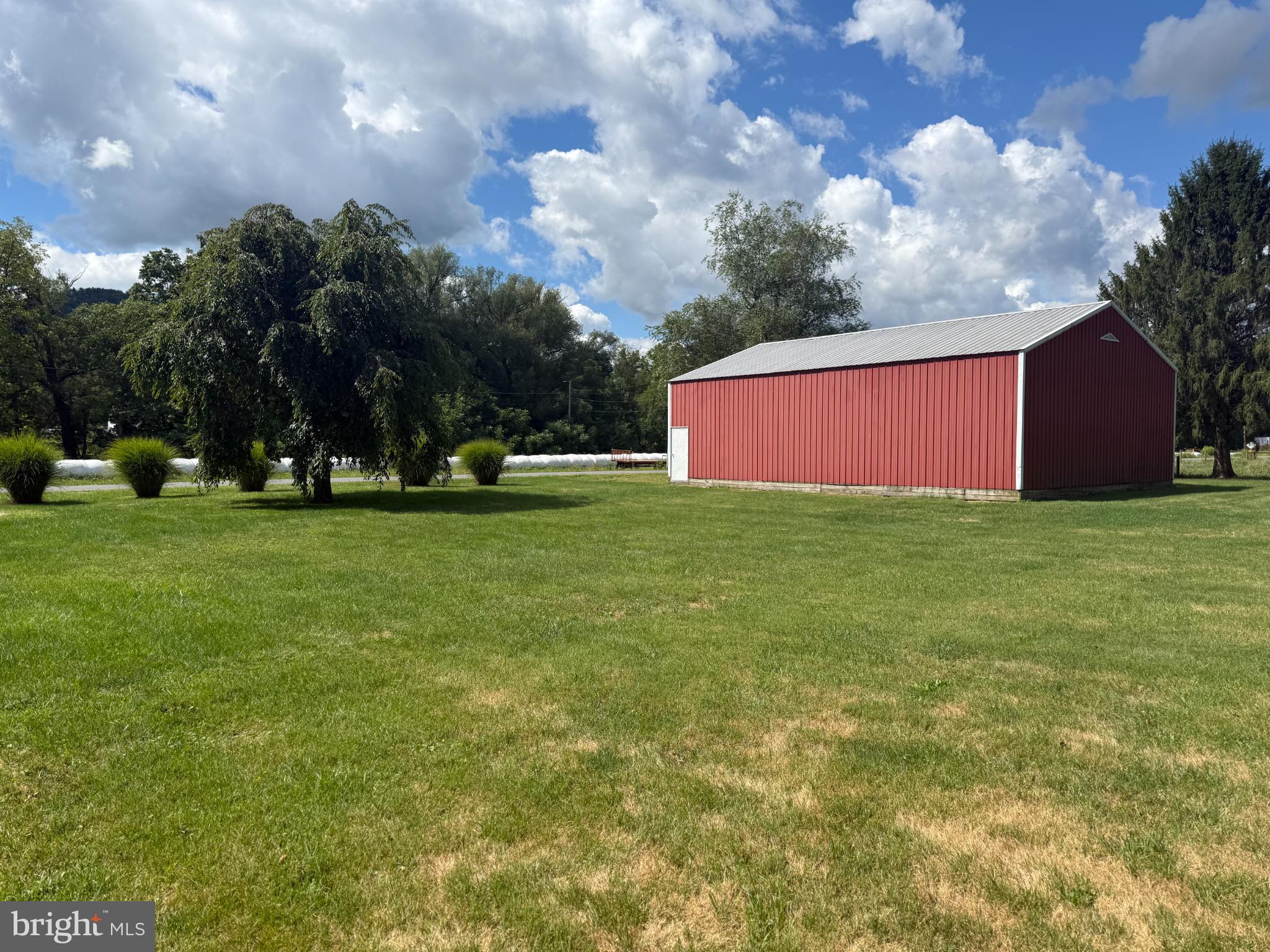 1329 Summer Mountain Road Loganton, PA 17747 - Photo 48 of 56 a view of field with trees in the background