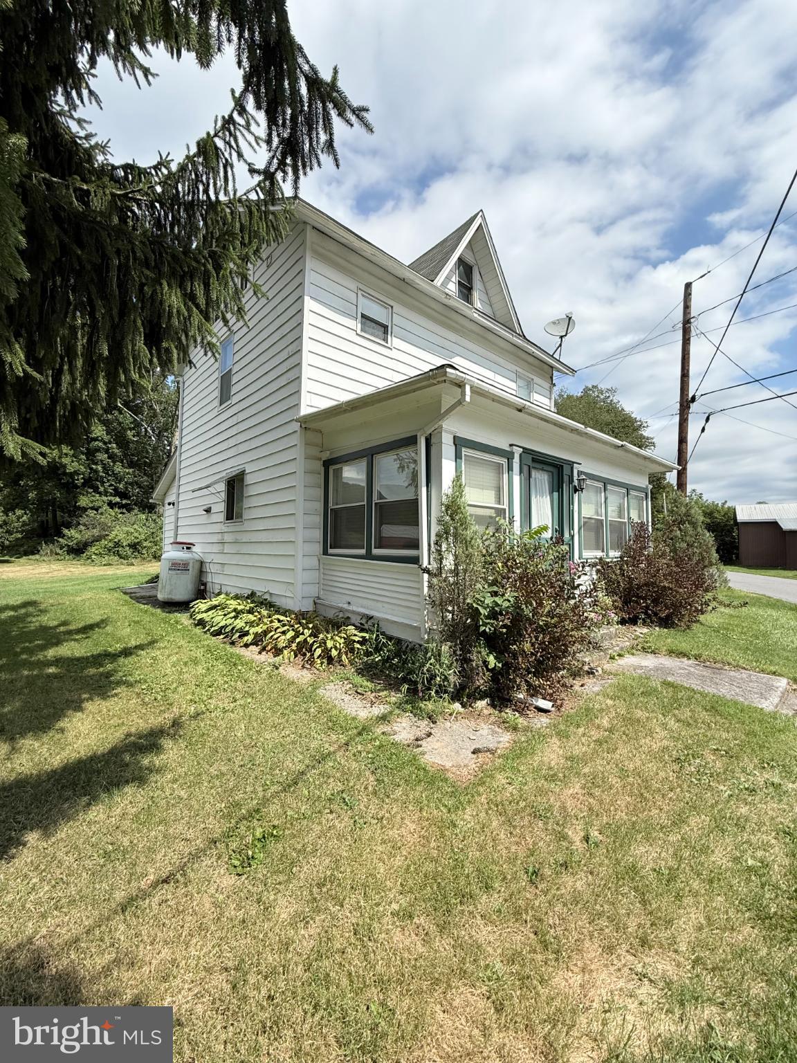 1329 Summer Mountain Road Loganton, PA 17747 - Photo 5 of 56 a view of house with backyard and garden