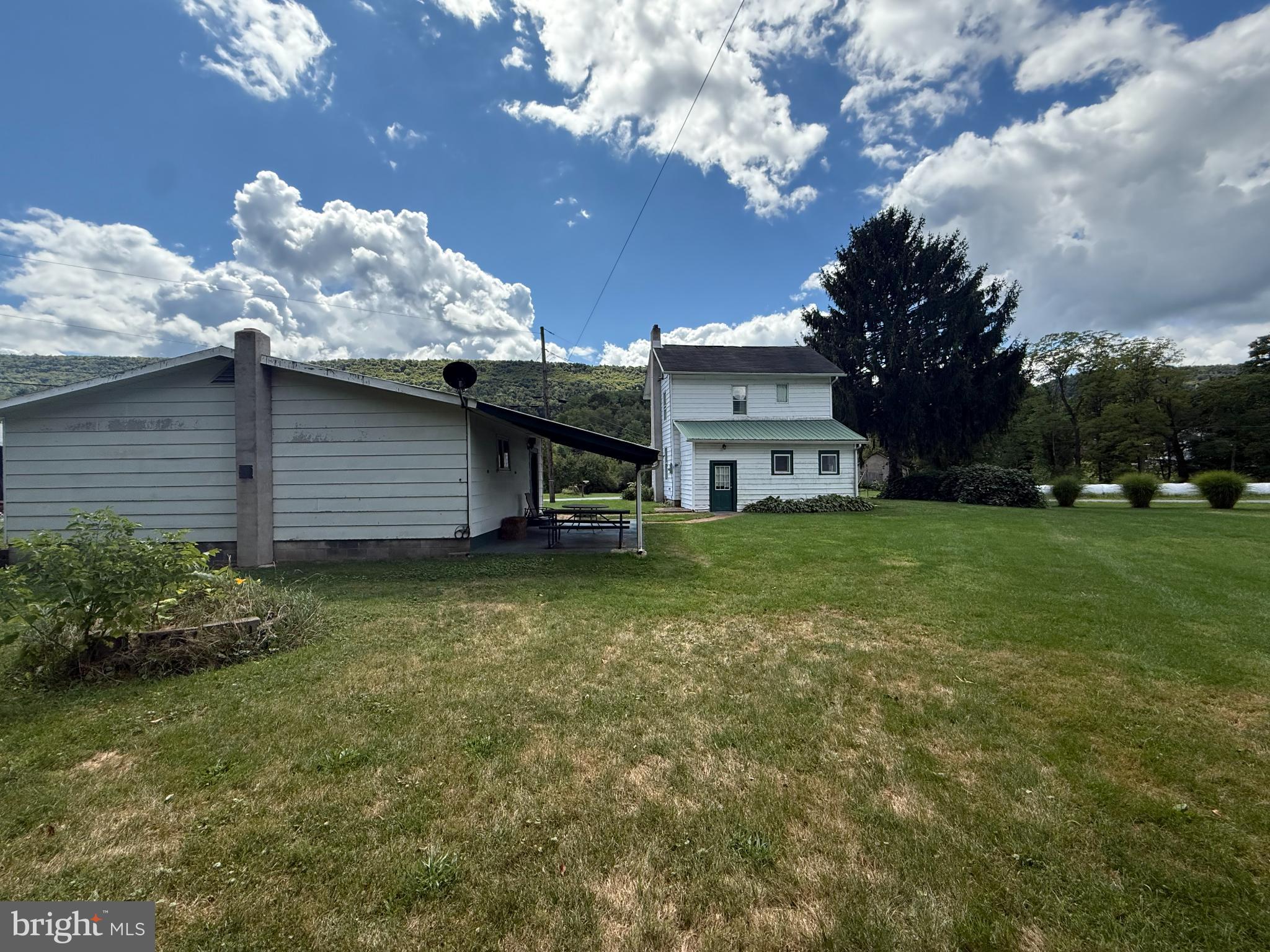 1329 Summer Mountain Road Loganton, PA 17747 - Photo 51 of 56 a view of a house with a backyard