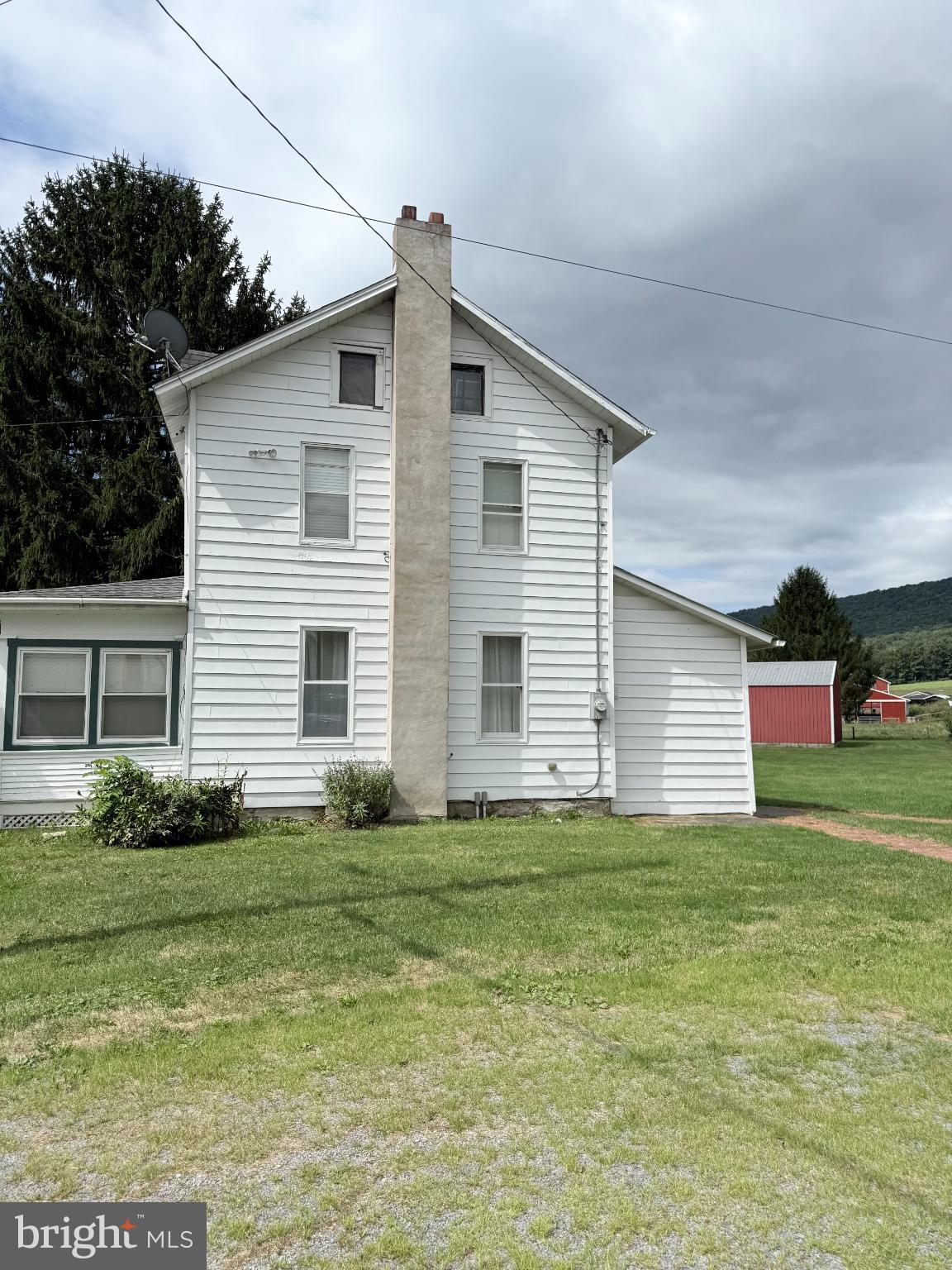 1329 Summer Mountain Road Loganton, PA 17747 - Photo 6 of 56 a view of a house with a yard