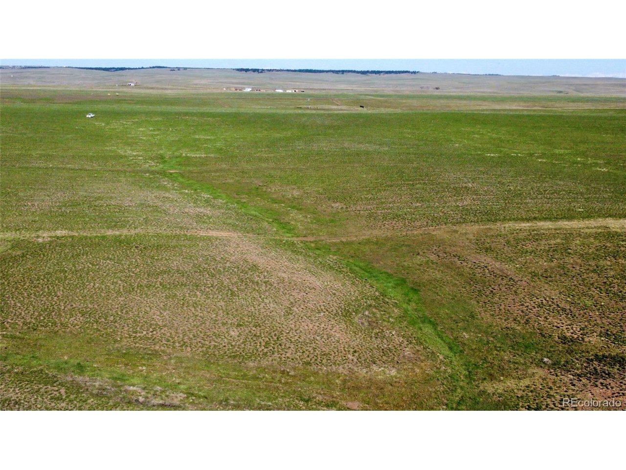 166 County Road Deer Trail, CO 80105 - Photo 5 of 10 a view of an ocean and beach