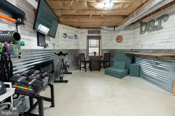 a view of a chairs and table in a room