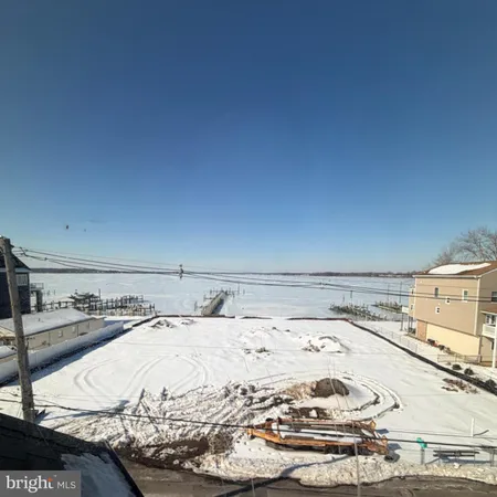a view of a kitchen with a sink