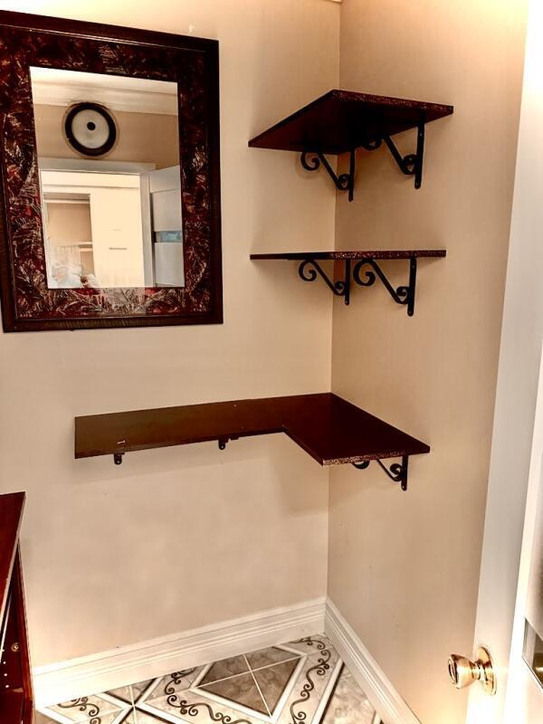 610 Northwest 13th Street, Unit 23 Boca Raton, FL 33486 - Photo 12 of 28 a view of a walk in closet