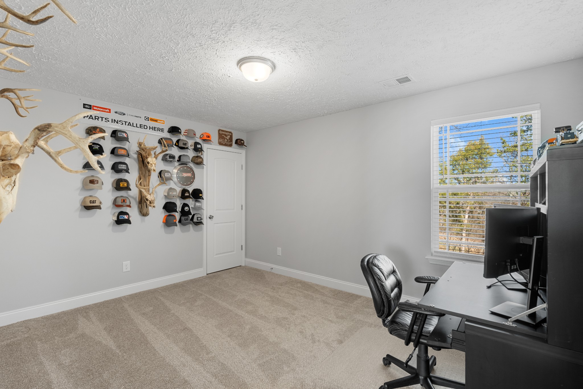 839 Cedar Lane Springfield, TN 37172 - Photo 24 of 34 a view of a workspace with furniture and a window