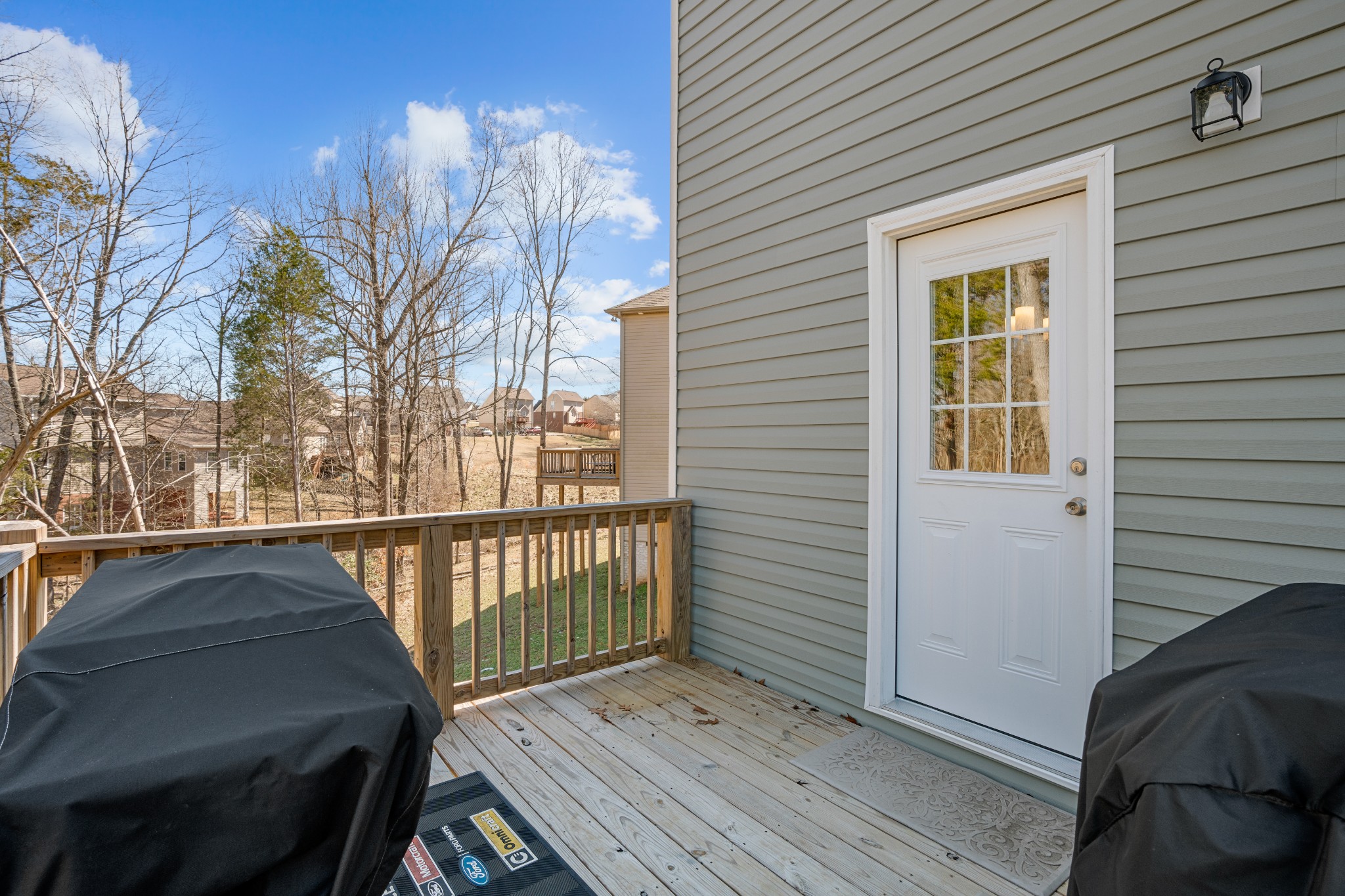839 Cedar Lane Springfield, TN 37172 - Photo 27 of 34 view of balcony with wooden floor and outdoor seating