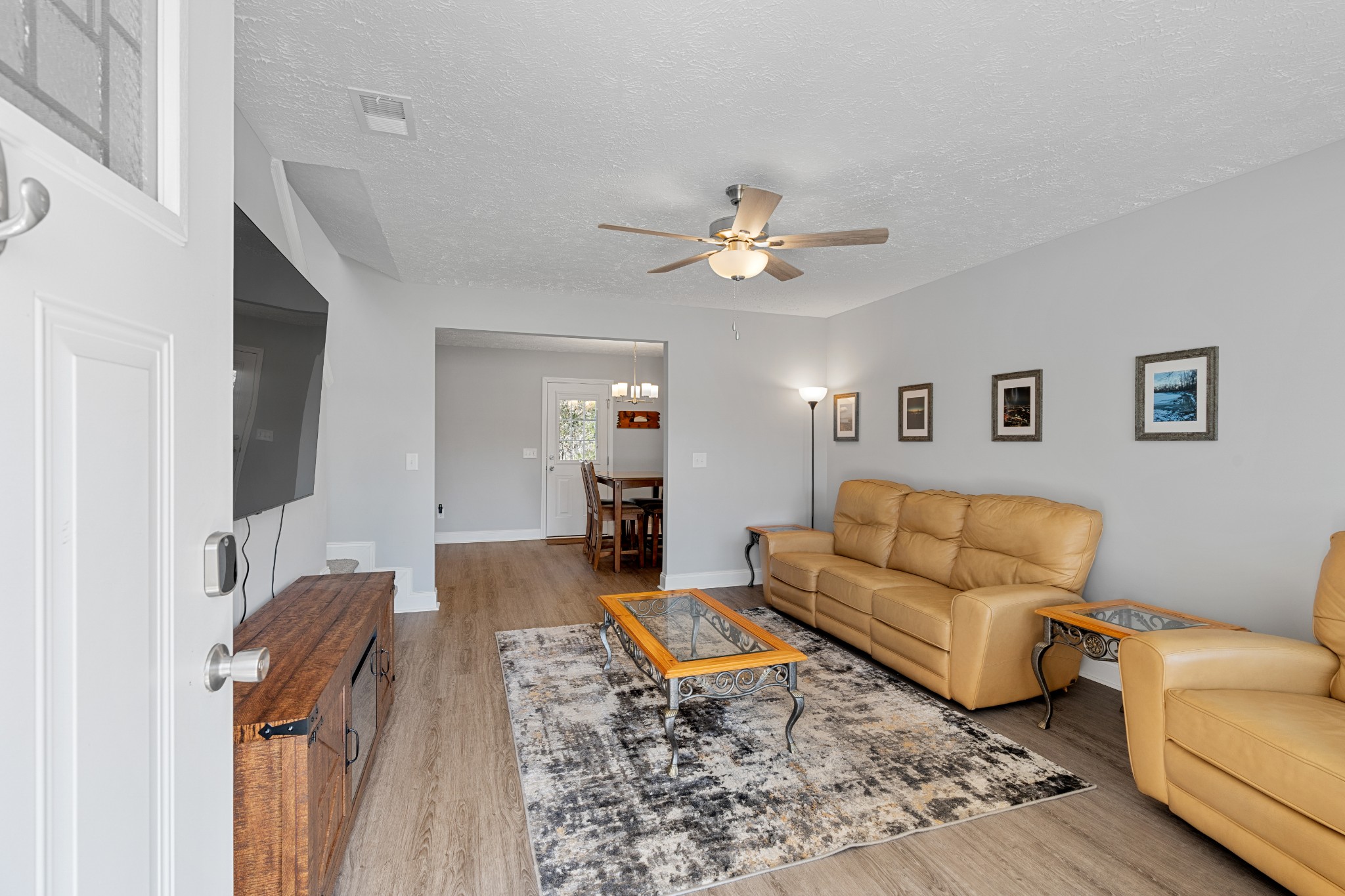839 Cedar Lane Springfield, TN 37172 - Photo 6 of 34 a living room with furniture ceiling fan and a rug