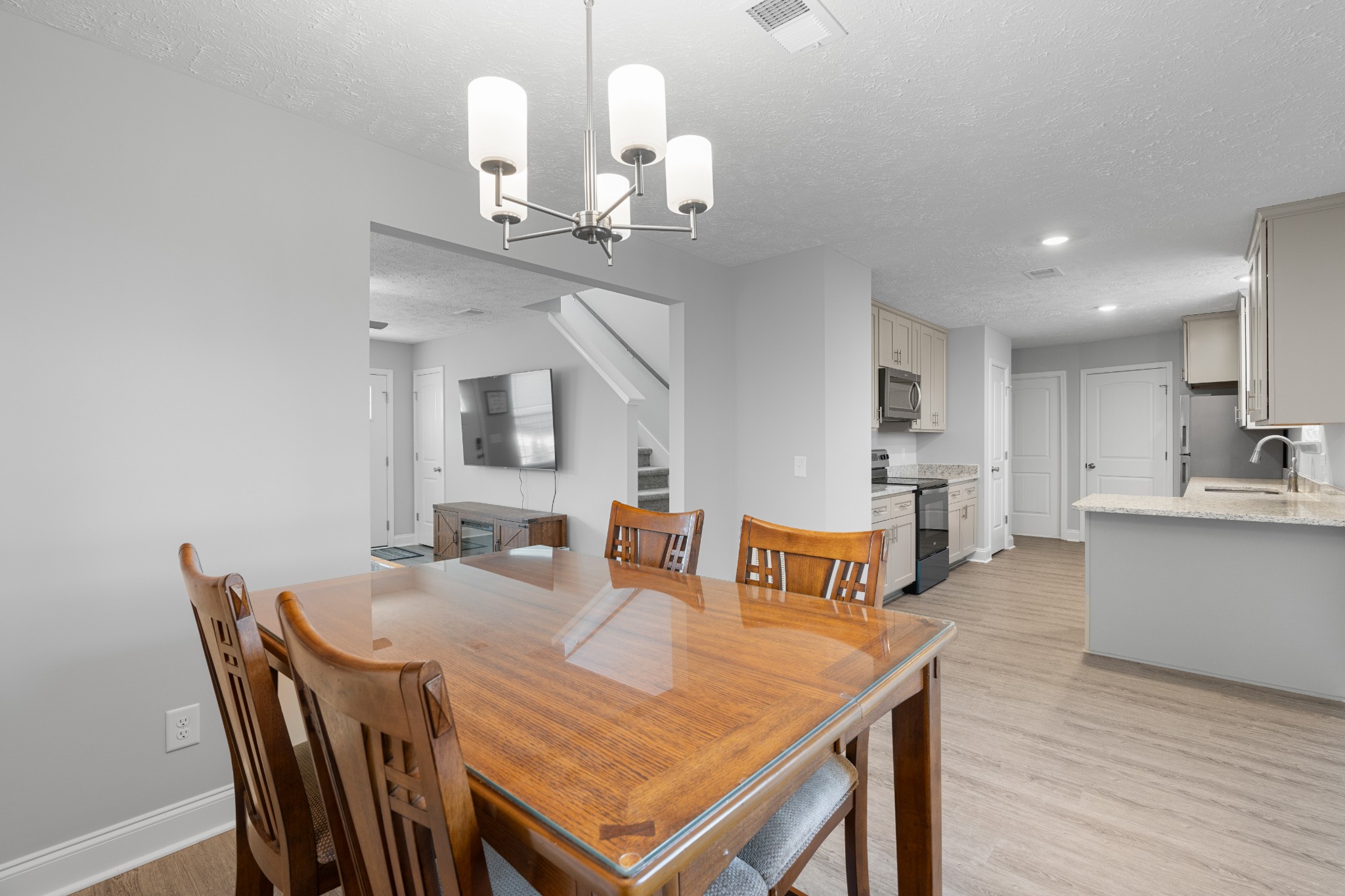 839 Cedar Lane Springfield, TN 37172 - Photo 7 of 34 a view of a dining room with furniture and wooden floor