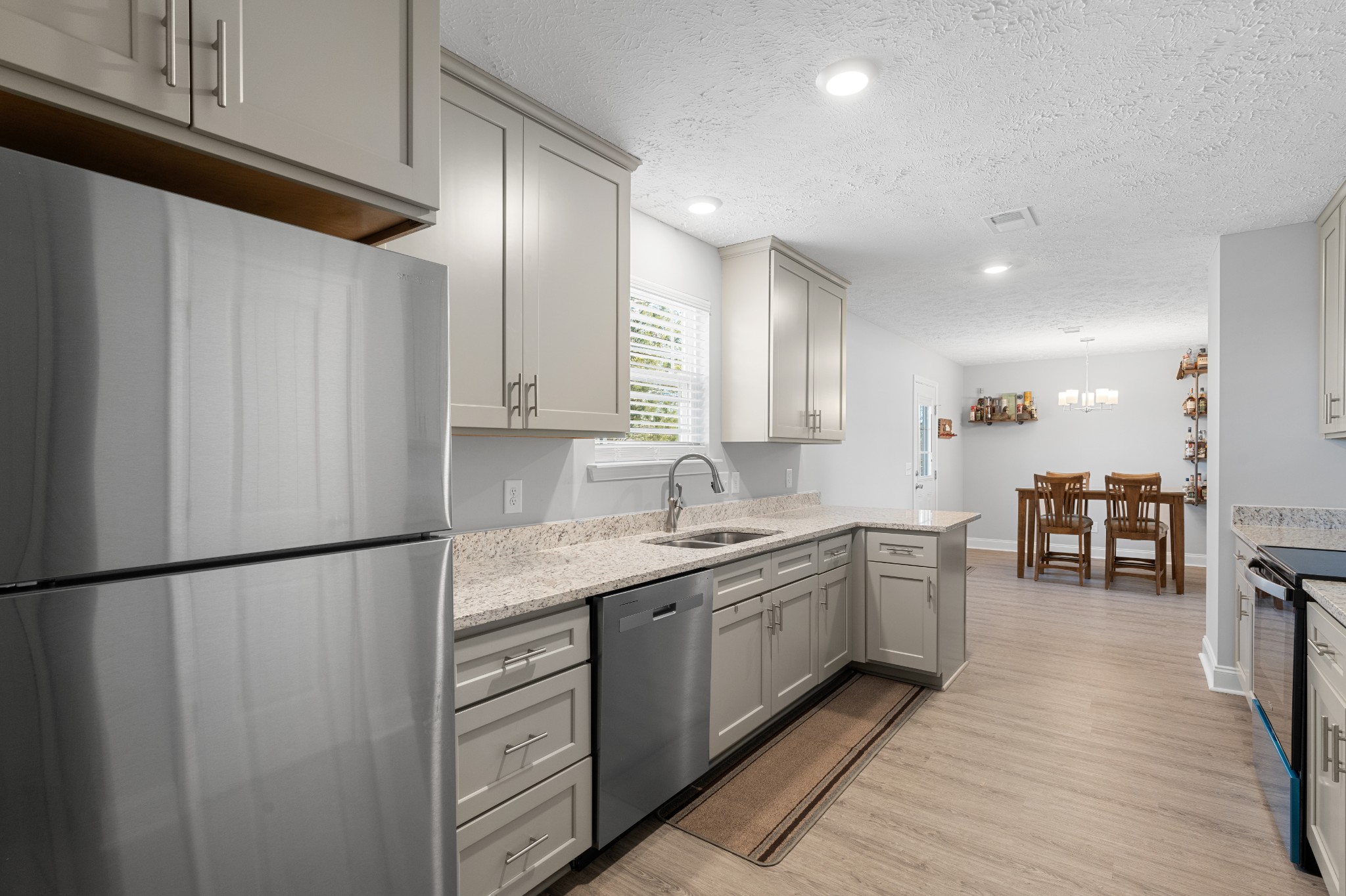 839 Cedar Lane Springfield, TN 37172 - Photo 8 of 34 a kitchen with stainless steel appliances granite countertop refrigerator sink and cabinets