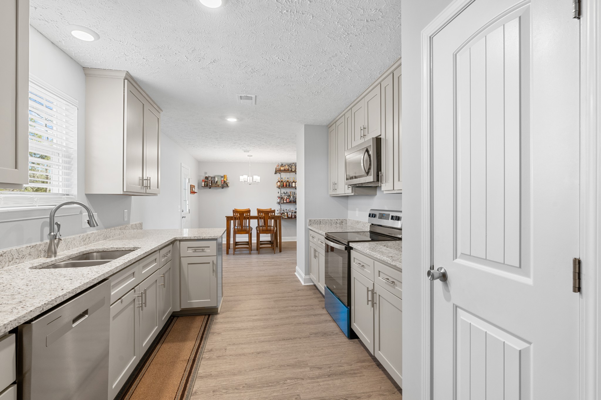 839 Cedar Lane Springfield, TN 37172 - Photo 9 of 34 a kitchen with stainless steel appliances granite countertop lots of counter top space and cabinets