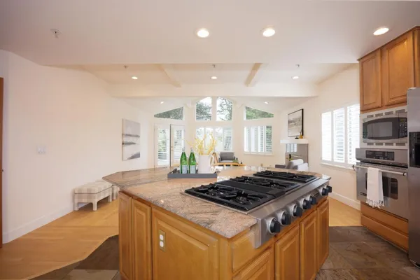 a kitchen with a stove and a sink