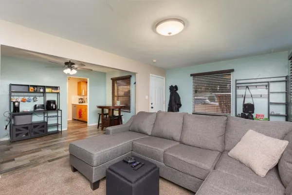 a living room with furniture and a window