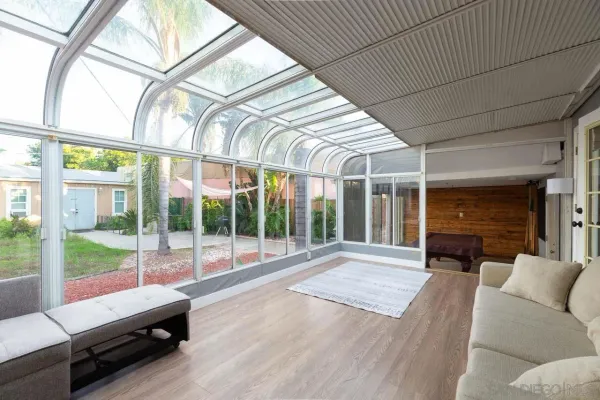 a view of livingroom with furniture and floor to ceiling window