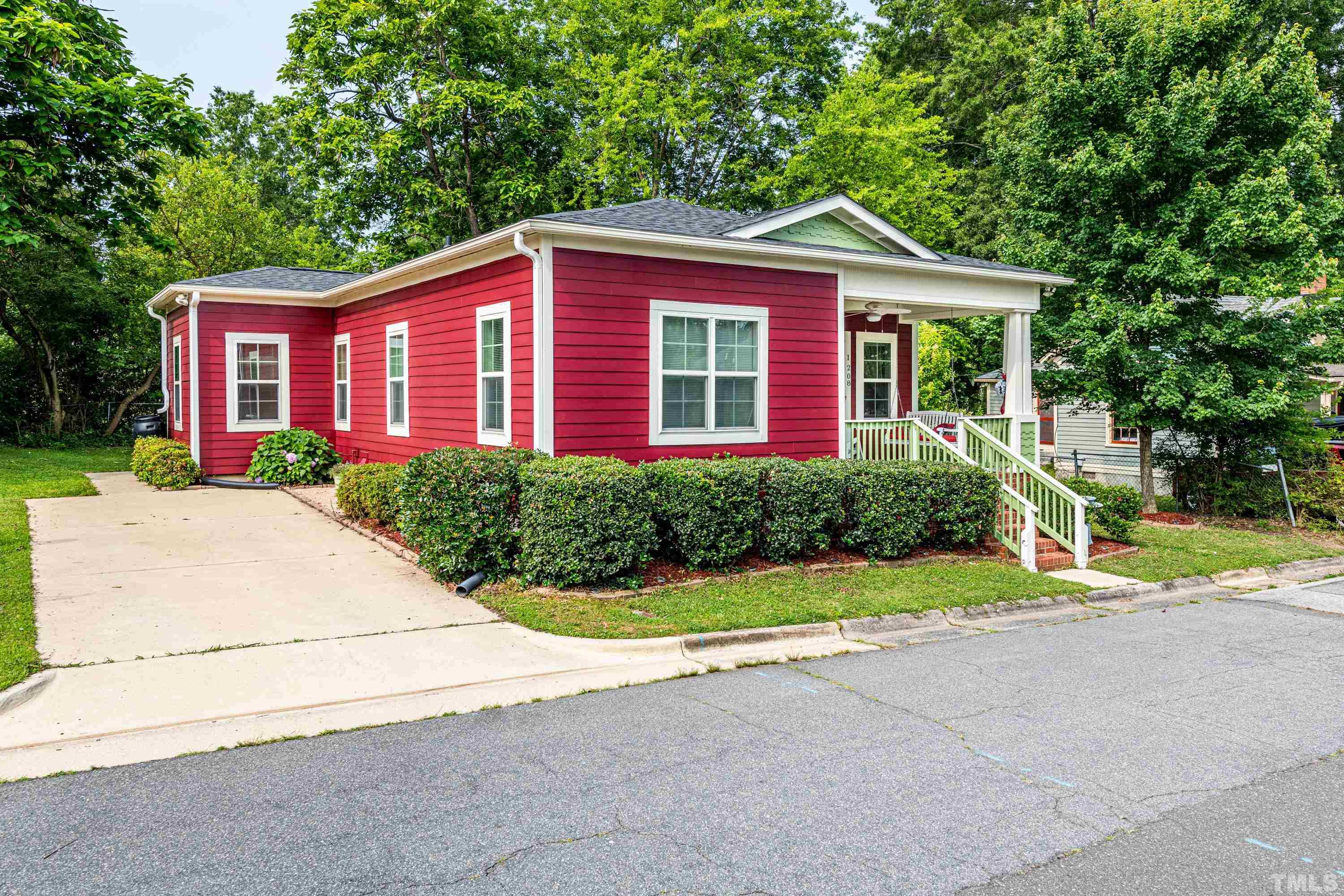 1208 Wall Street Durham, NC 27701 - Photo 2 of 27 a front view of house with yard and green space