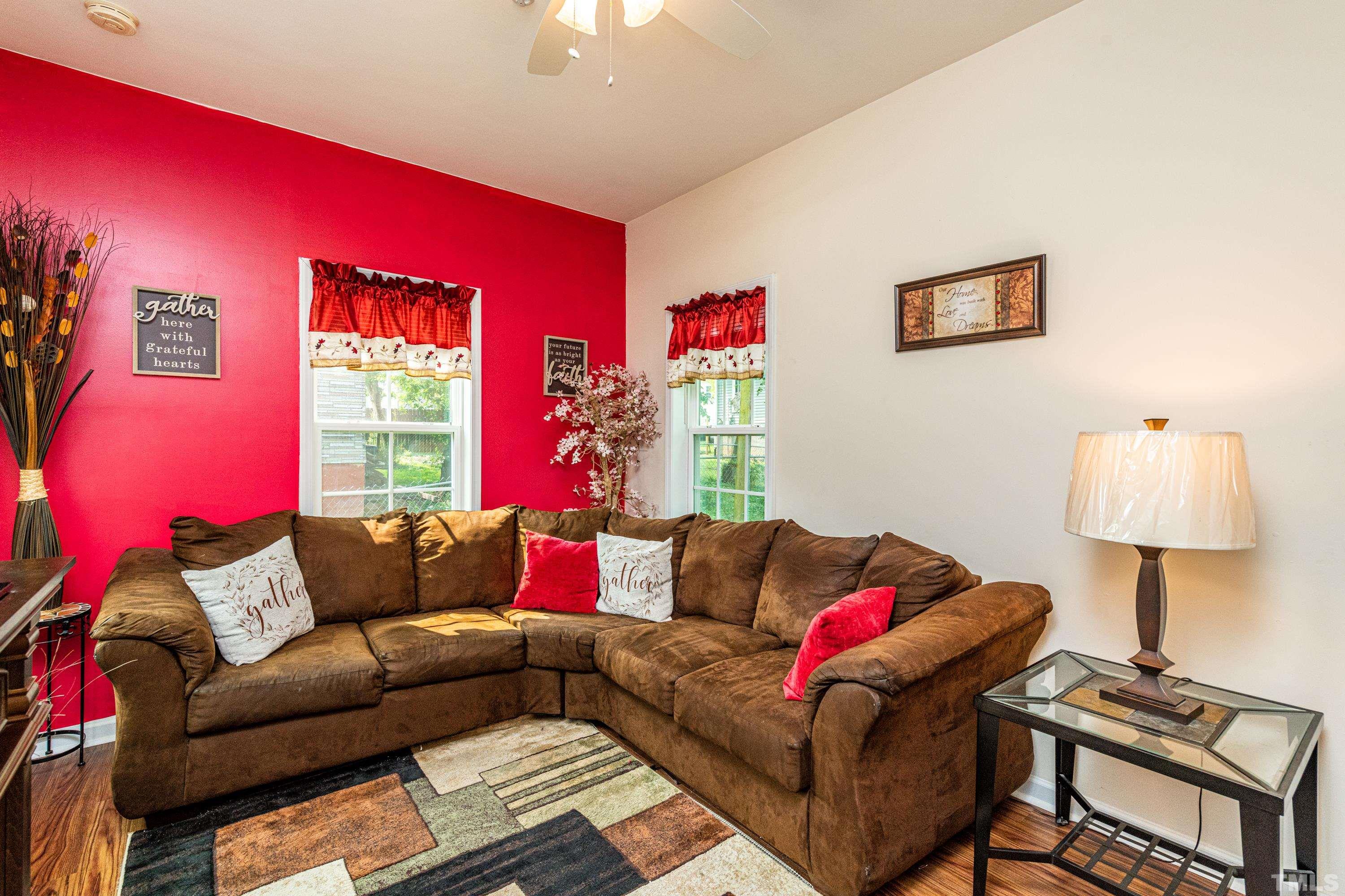 1208 Wall Street Durham, NC 27701 - Photo 22 of 27 a living room with furniture and a window