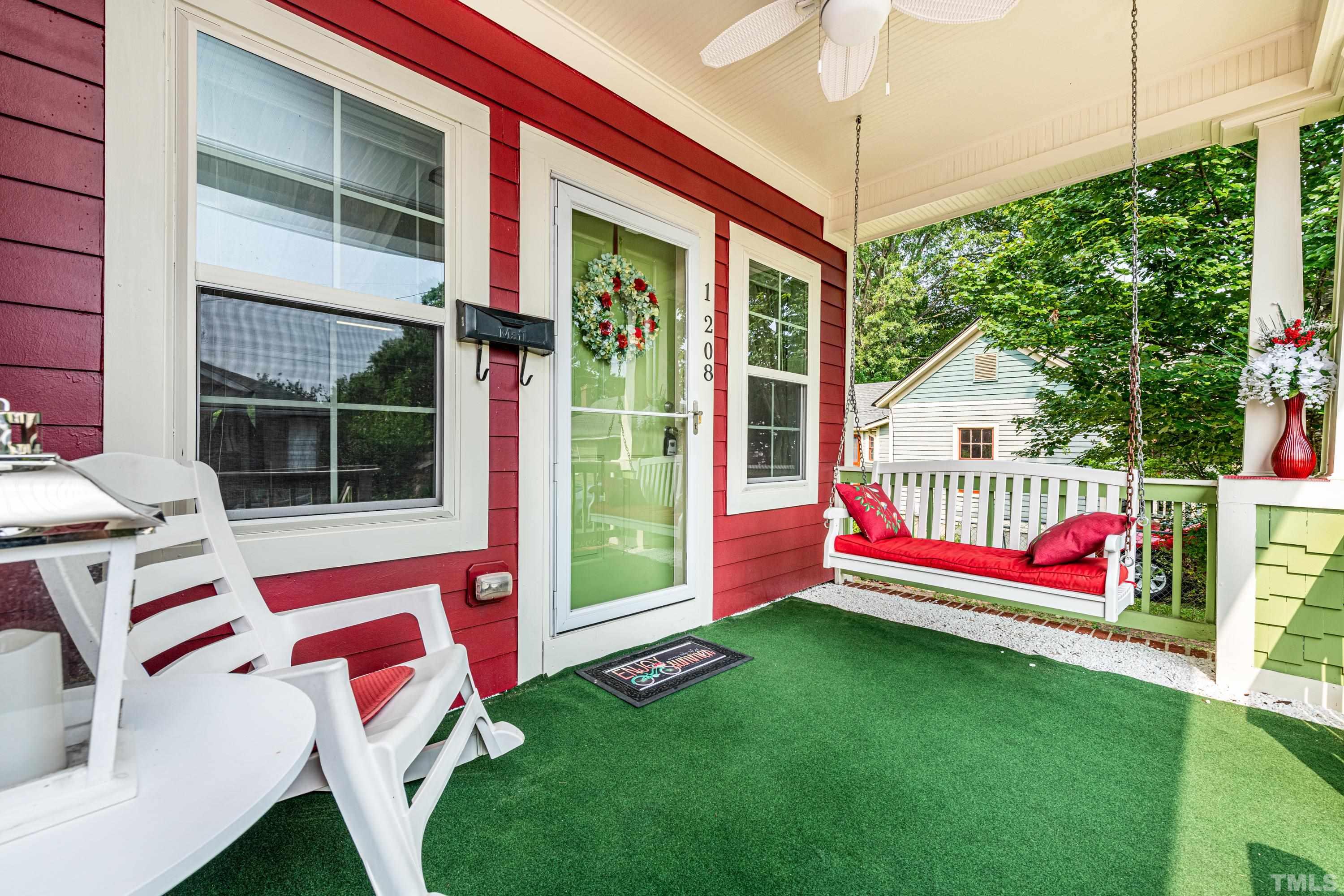 1208 Wall Street Durham, NC 27701 - Photo 4 of 27 a front view of a house with yard and porch