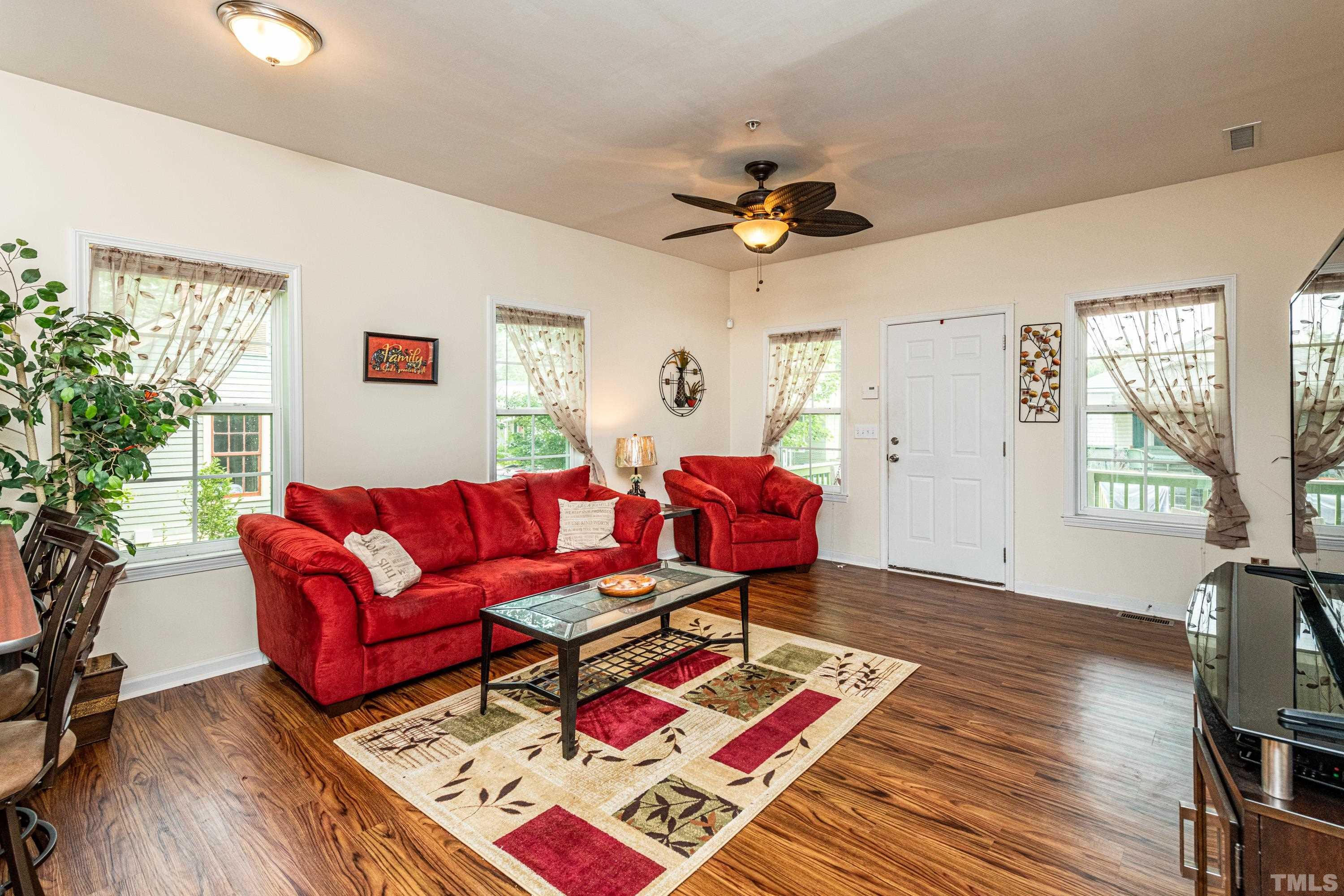 1208 Wall Street Durham, NC 27701 - Photo 5 of 27 a living room with furniture and a window