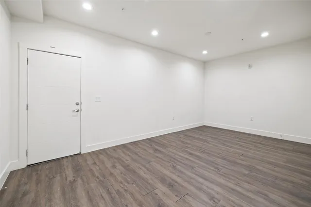 a kitchen with a sink stove and microwave